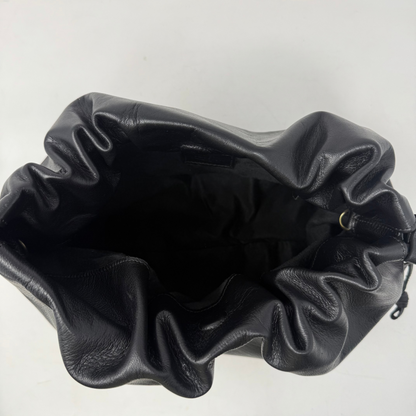 Black leather drawstring bag on a white background