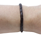 Adjustable twisted artisan leather bracelet jewelry for men and women by Artisan Stories on wrist