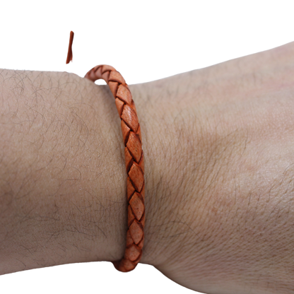 Adjustable twisted artisan leather bracelet jewelry for men and women on wrist by Artisan Stories