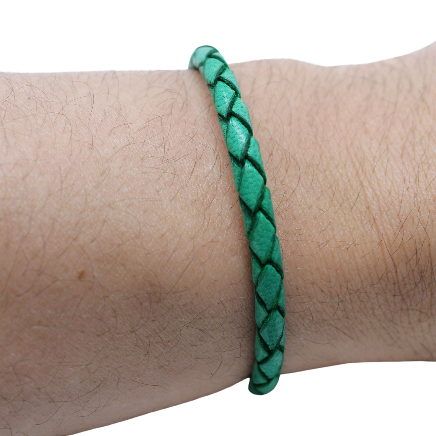 Adjustable twisted artisan leather bracelet jewelry for men and women in green on wrist by Artisan Stories