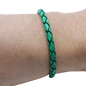 Adjustable twisted artisan leather bracelet jewelry for men and women in green on wrist by Artisan Stories