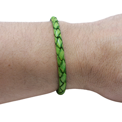 Adjustable twisted artisan leather bracelet jewelry for men and women in green on wrist